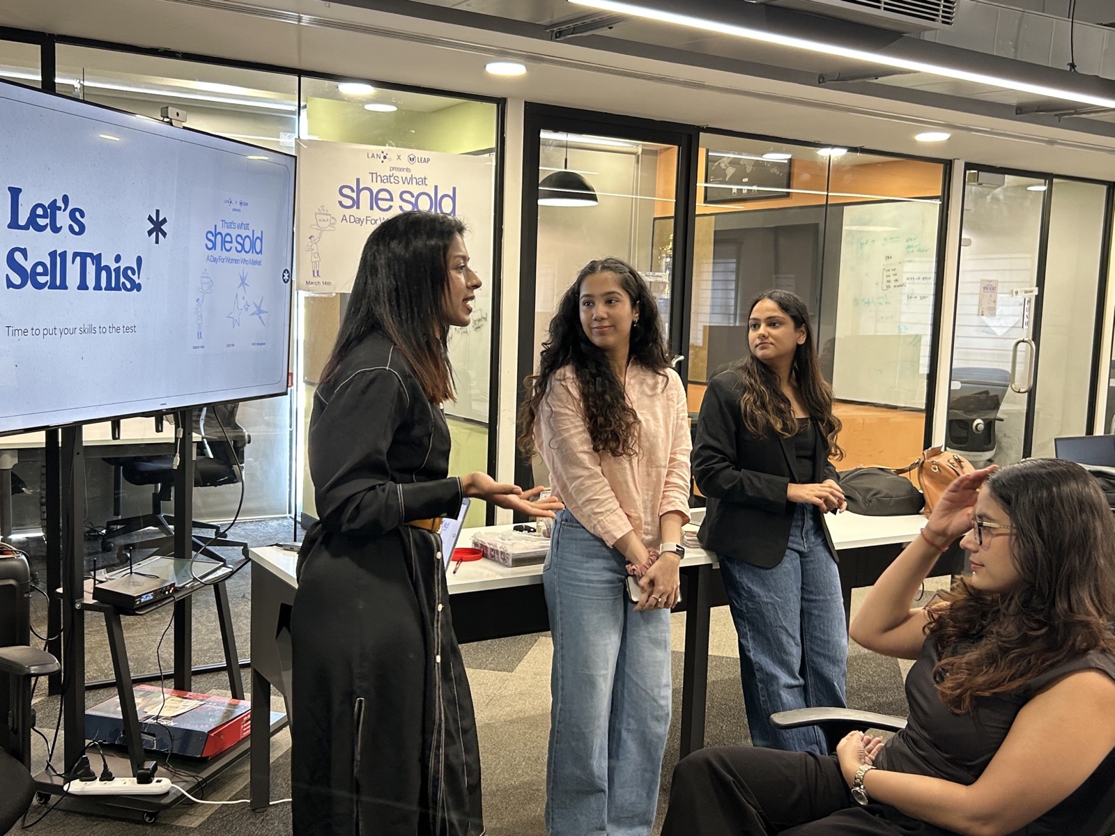 A participant presenting during the That’s What She Sold pitch challenge